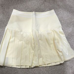 Pleated Mini Skirt with High Knit Waist in Pale Yellow